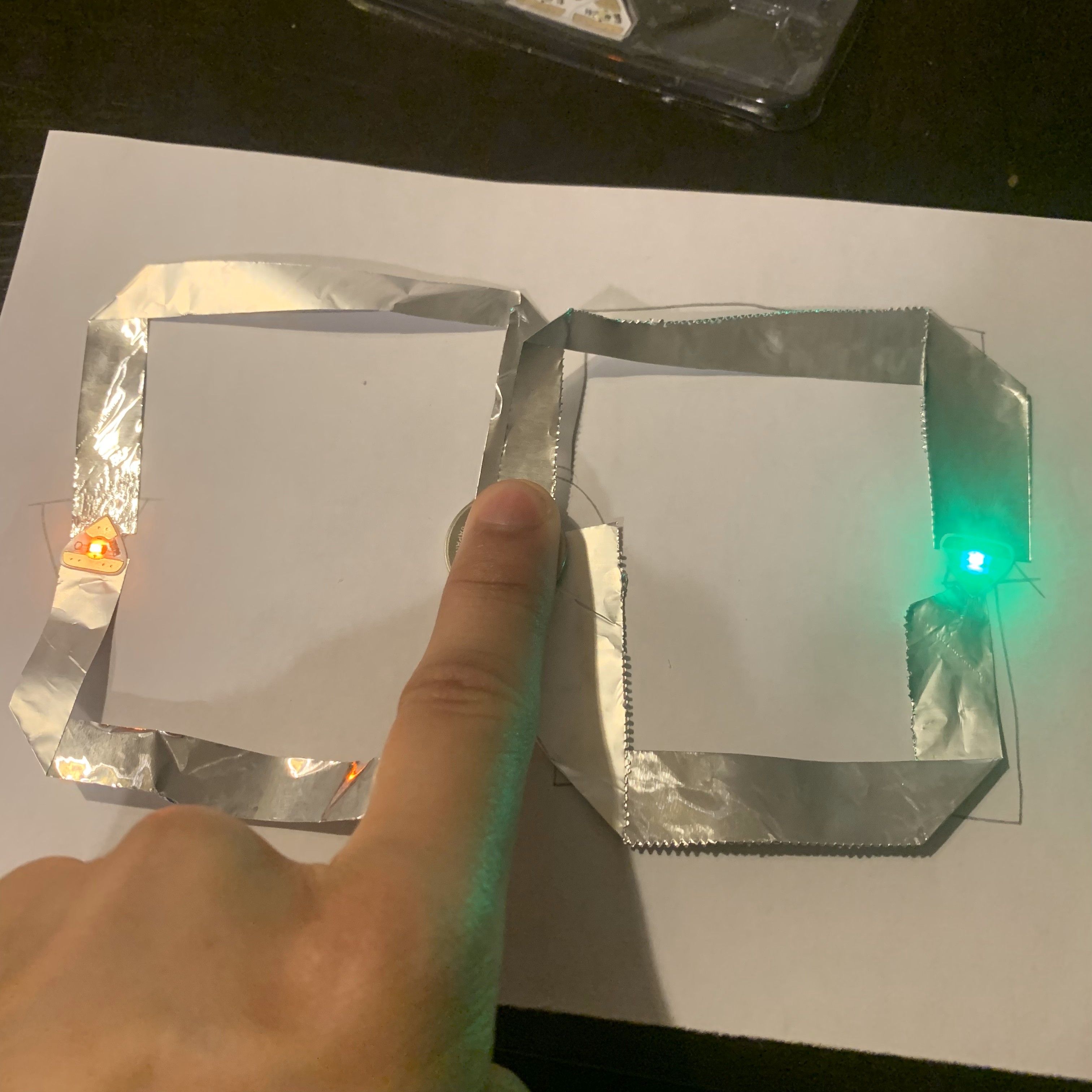 Tested the first Aluminium Foil circuit via contact with pointing finger.