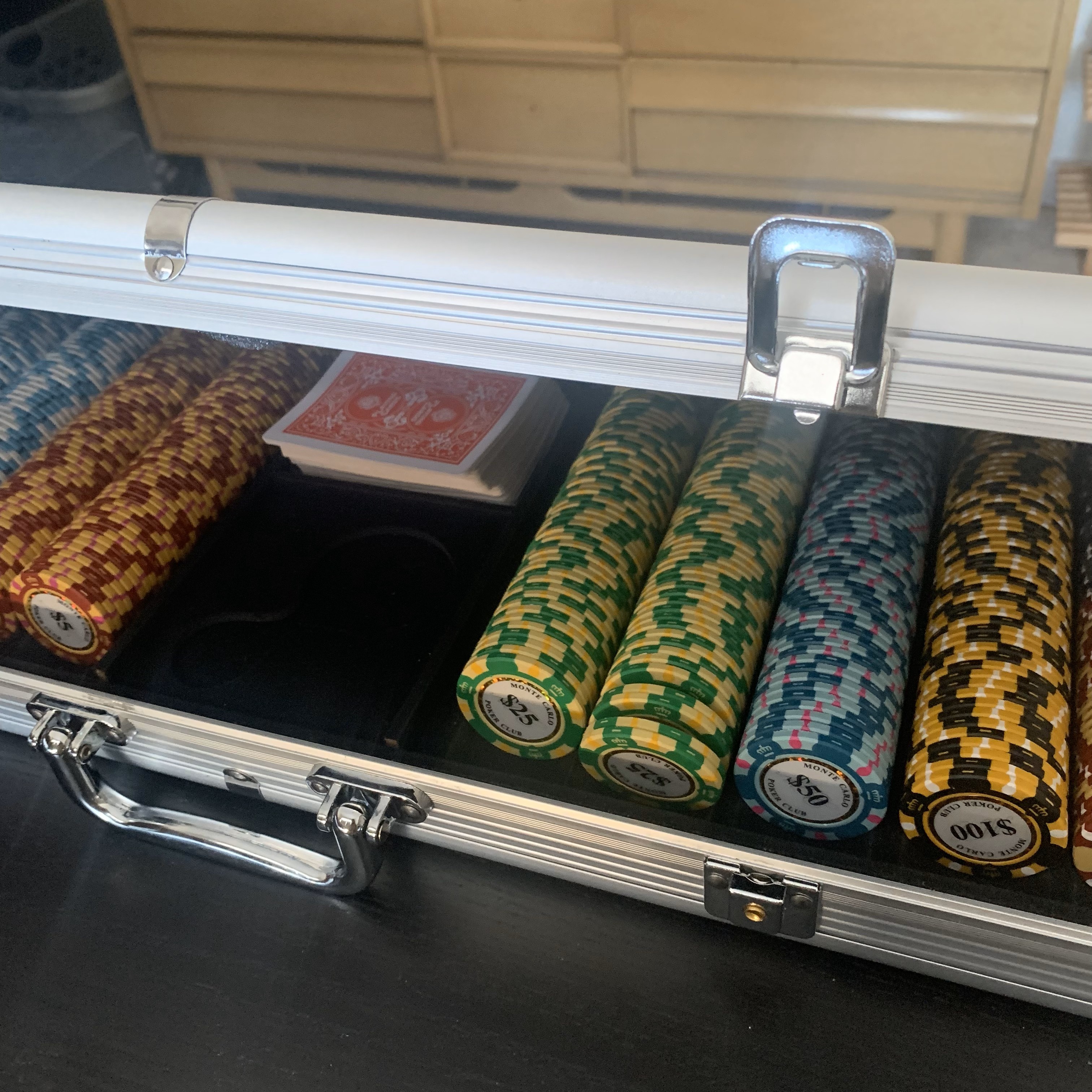 It operates by unlinking the laches at the front when laid down on its side.