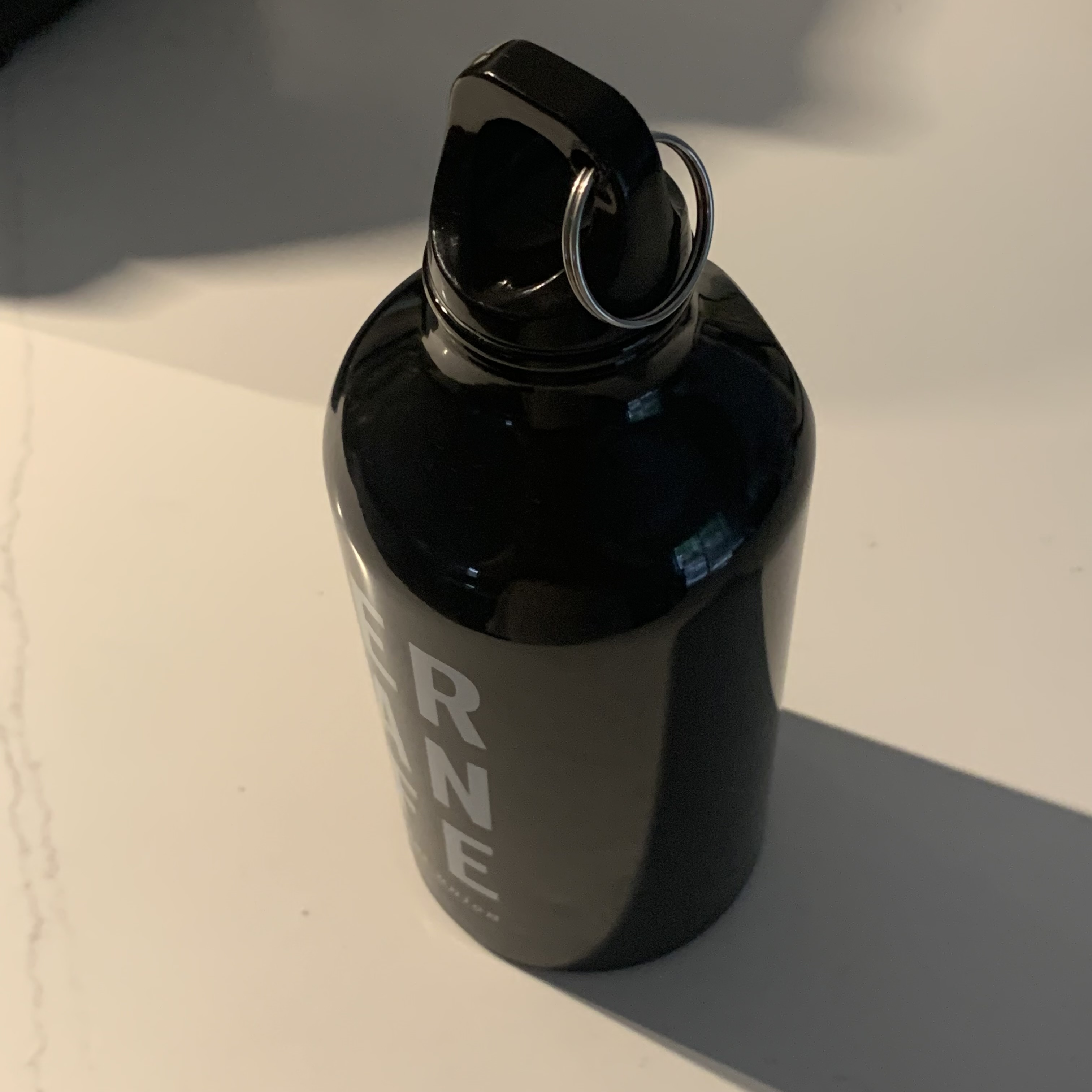 The material present in the photo is Metal which is formed into a Sheridan labelled Water Bottle founded by Sheridan College. <div class='container'><iframe class='responsive-iframe' src='https://www.youtube.com/embed/tgbNymZ7vqY'></iframe></div>